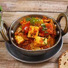 Paneer cheese with diced onion & bell peppers with sauce